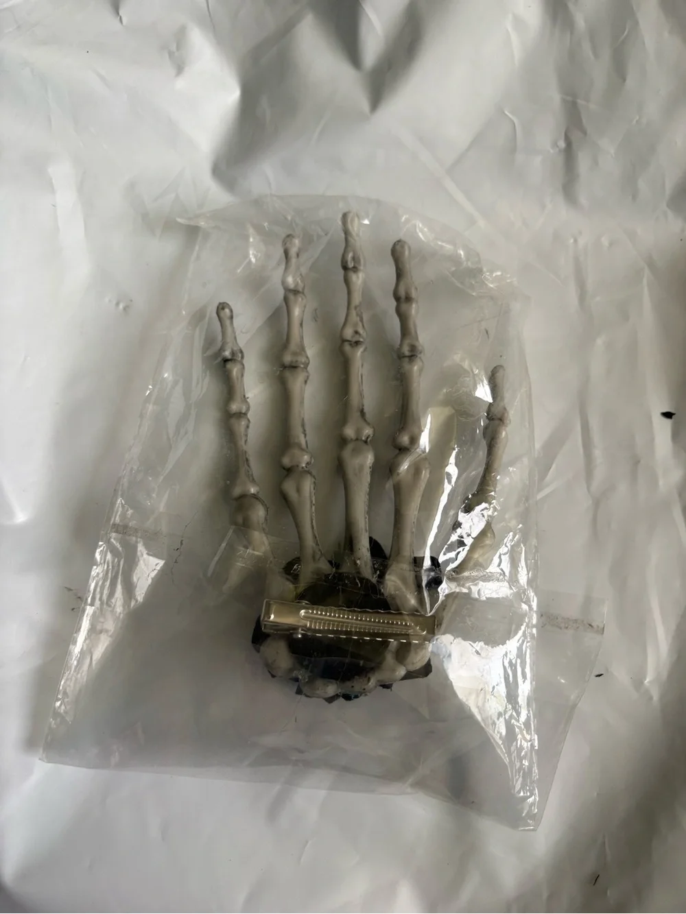 Gothic-style skeleton hand hair clip